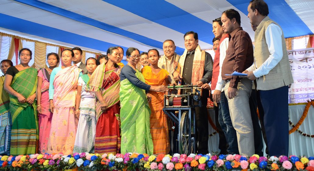 Sarbananda Sonowal distributing equipment to SHGs at Muga Fair and workshop organised at Khanapara on Saturday.