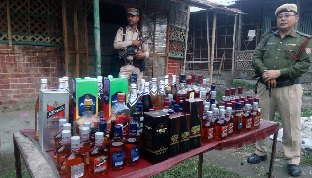 https://nenow.in/wp-content/uploads/2018/03/Illegal-liquor-bottles-recovered-in-Namrup.jpg