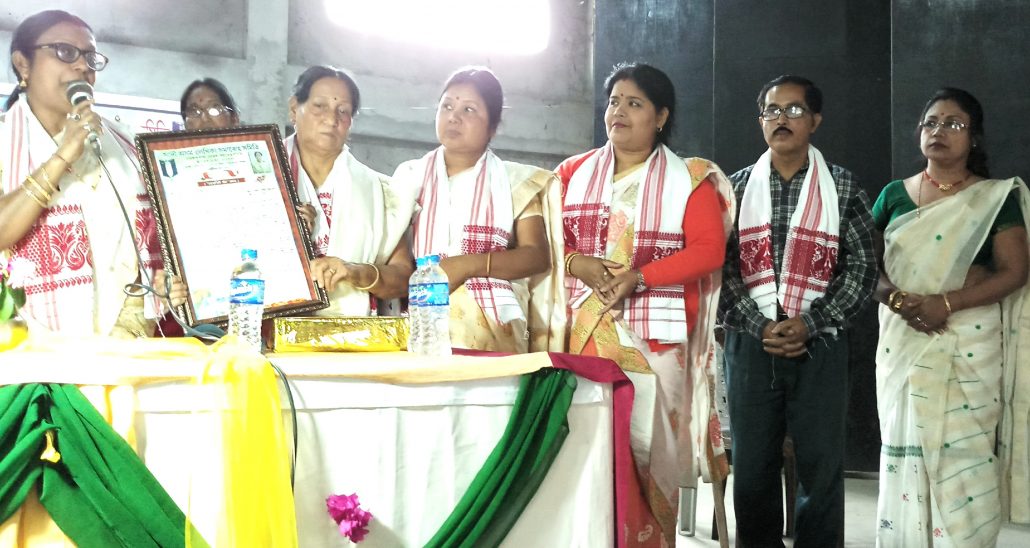 'Tejashwini' title being presented to Bibi Mahanta.