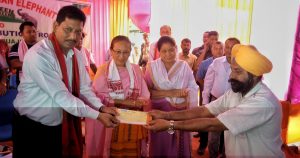 Assam PHE, Food & Civil Supplies Minister Rihon Daimari handing over an ex gratia cheque to the member of a victim’s family at Garuajhar in Udalguri on Tuesday.