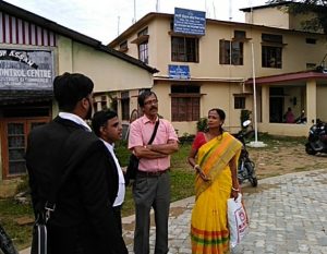 Niyati Roy, daughter of Chandradhar Das talking to her lawyers outside foreigners' tribunal 6 in Silchar's Sonai road on Tuesday