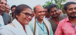 Dr Rajdeep Roy of BJP and Sushmita Dev of INC shaking hands post declaration of results on Thursday