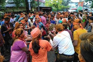 Supporters of the BJP dancing on the streets of Silchar on Friday ahead of vijay rally for its winning candidate Dr Rajdeep Roy